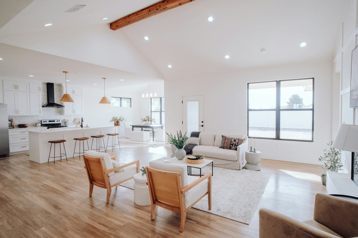 A modern and contemporary home with a bright and airy kitchen and living room. 